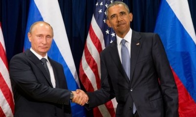 Presidents Obama and Putin handshake