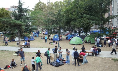 Refugees Resting in Park