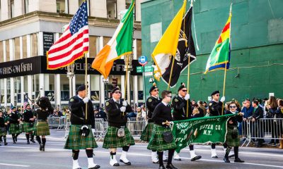 54468148 - new york-march 17- marchers with flags dressed in kilts march in the st patrickâ��s day parade on on 5th ave in new york city.